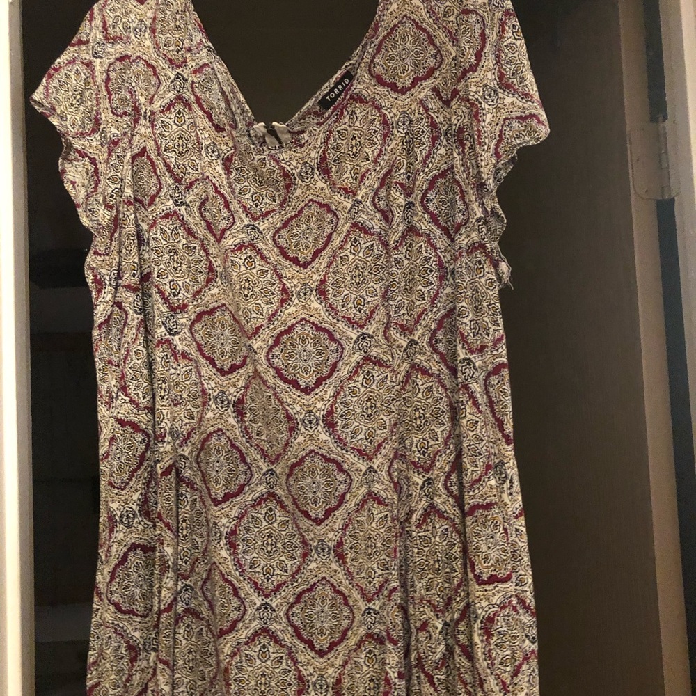 High low baby doll fit top.